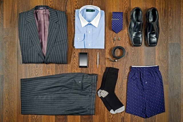 Packing Light: Essential Men’s Wear for Business Trips
