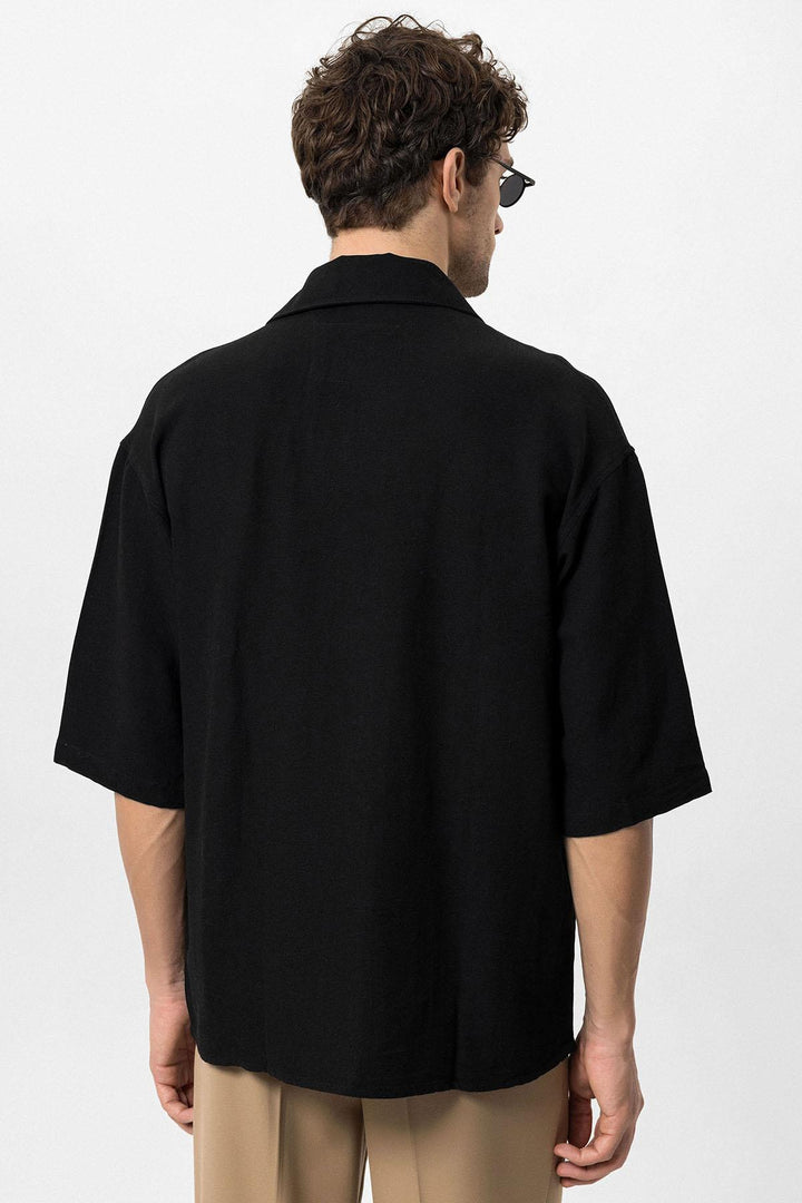 Chemise surdimensionnée noire à manches longueur coude et fermeture à boutons cachés pour hommes - Wessi